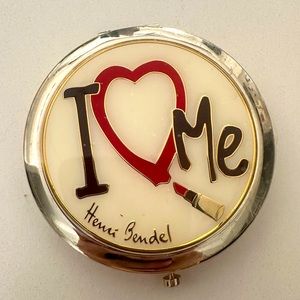 New in plastic Henri Bendel mirror